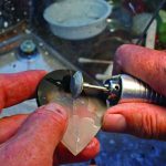 Grinding the rays on a cabochon