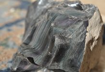 rainbow obsidian and lake county diamonds are highly collectible like this large piece of rainbow obsidian