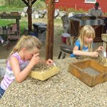 Children finding garnets at Red Rock Mine