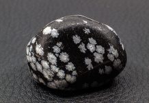 tumbled snowflake obsidian with snowflakes that are silicon dioxide polymorph cristobalite