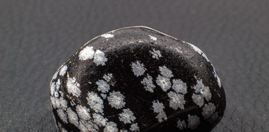 tumbled snowflake obsidian with snowflakes that are silicon dioxide polymorph cristobalite