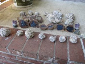 how to cut thundereggs involves first cutting into halves and then sanding and polishing