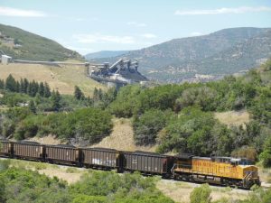 view of west elk coal mine with train cars loaded with coal 