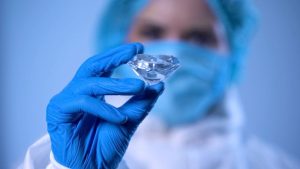 lab grown diamond being held up by a scientist