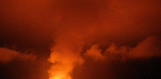 eruption in hawai`i volcanoes national park where pele's curse is said to have begun